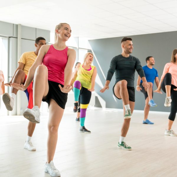 active-people-taking-part-zumba-class-together